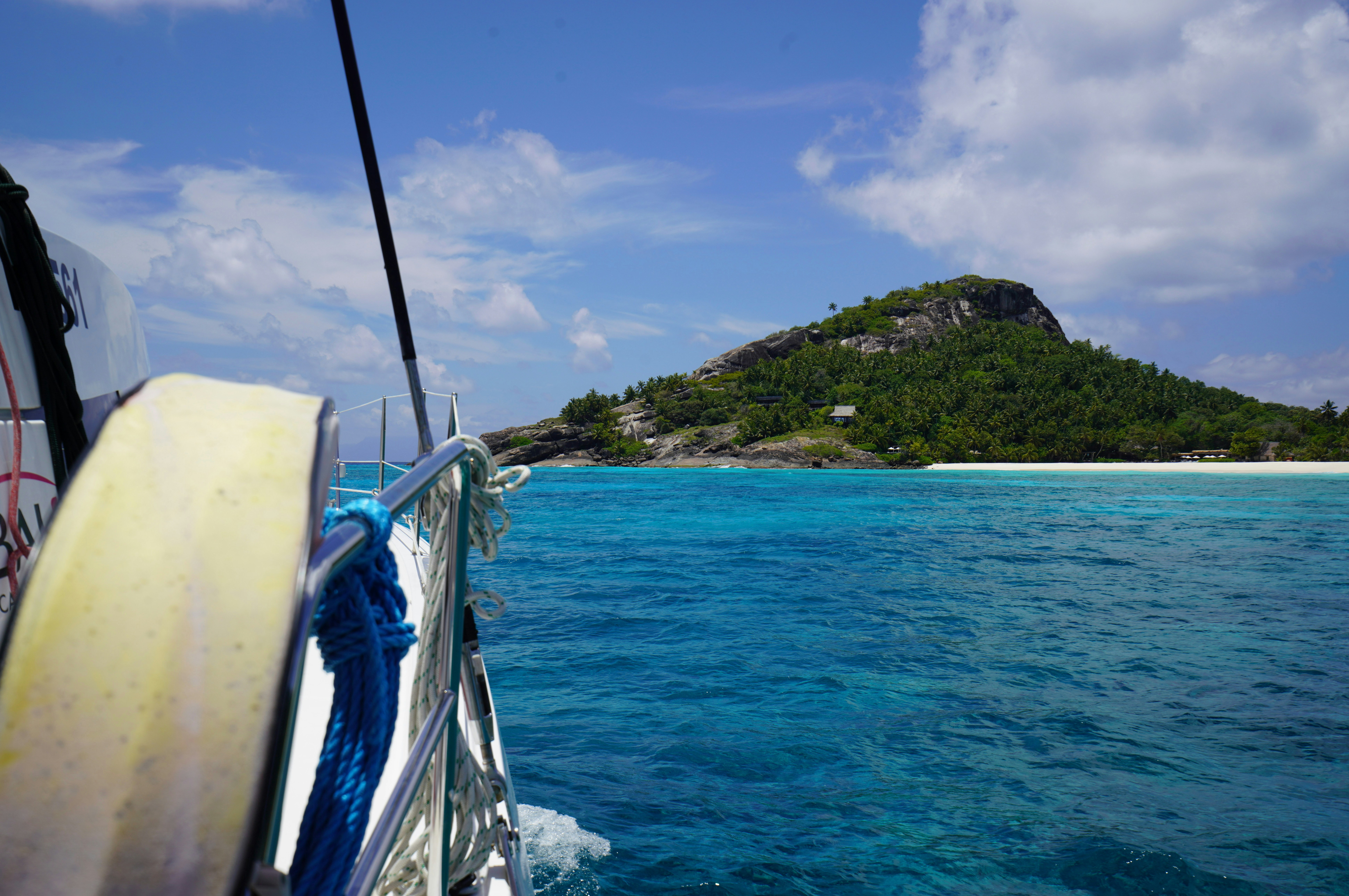 a boat on the water, A summer vacation trip to the North Islands of Seychelles