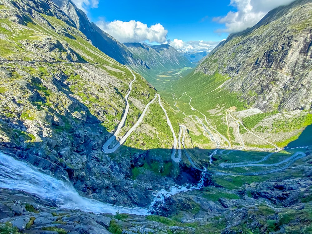 a winding road through a valley