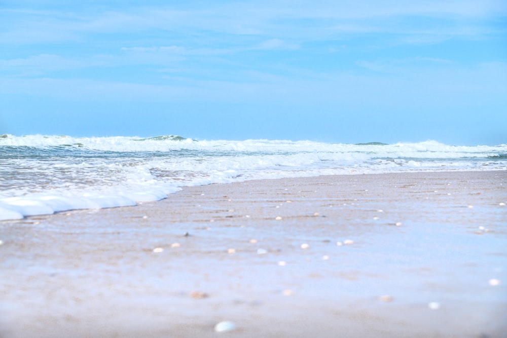 a beach with waves crashing