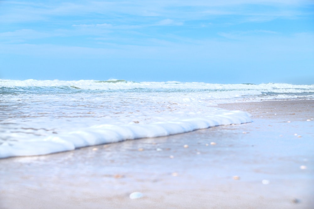 a beach with waves crashing