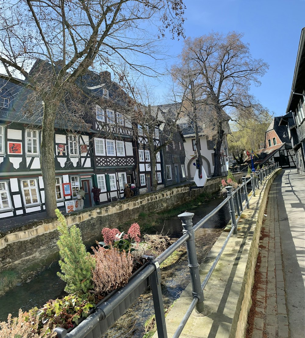 a path with a building on the side