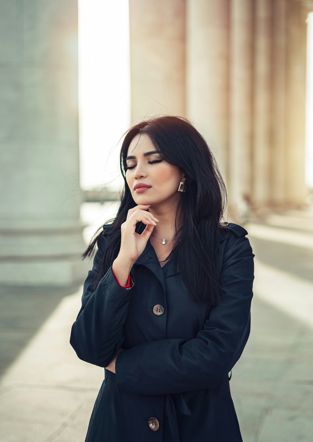 a woman in a black coat