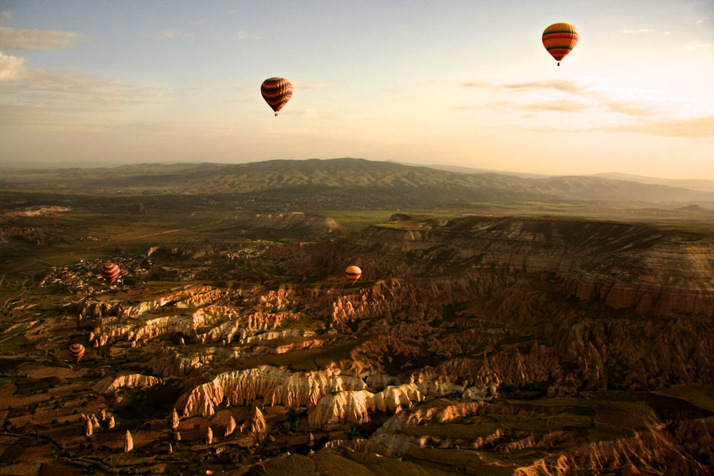 hot air balloons over a city