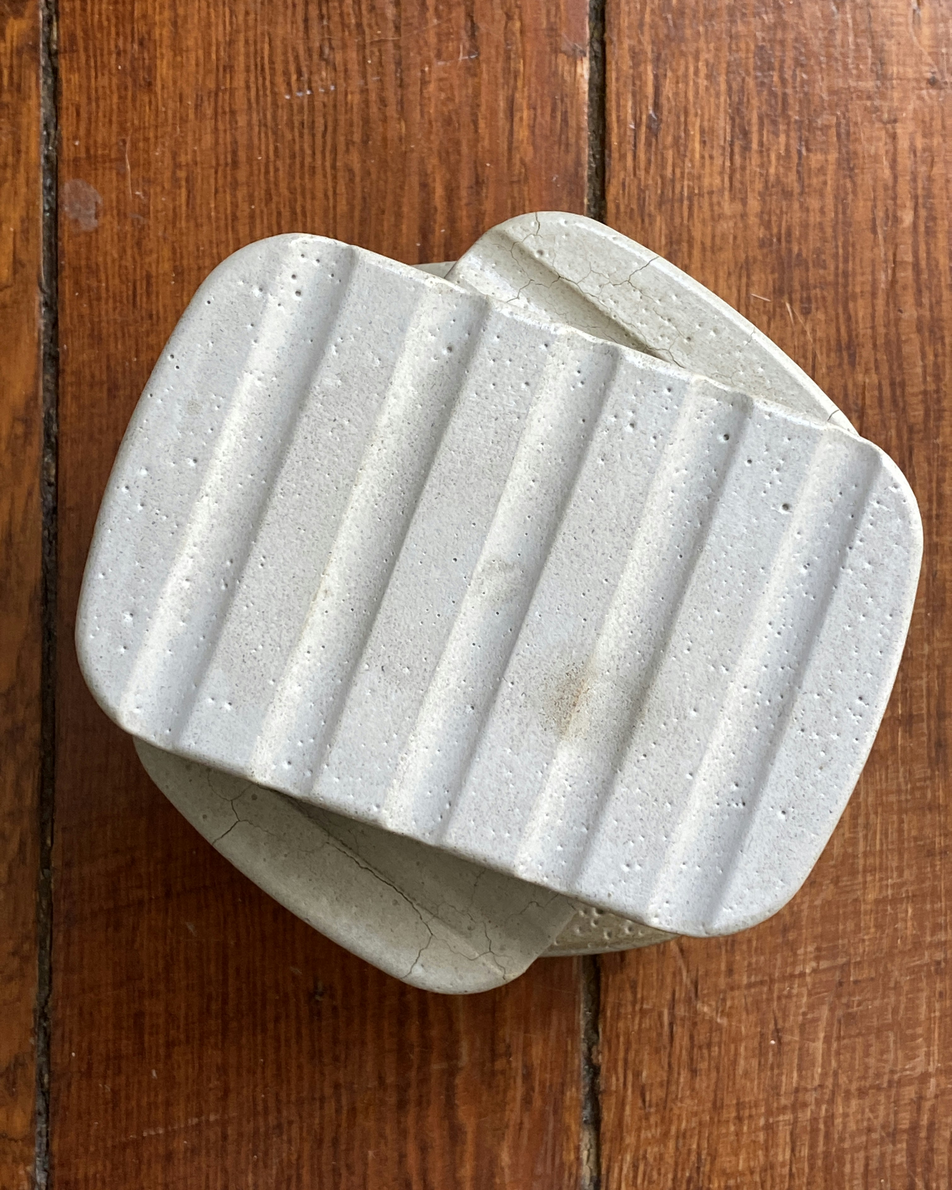 a white piece of paper on a wooden surface