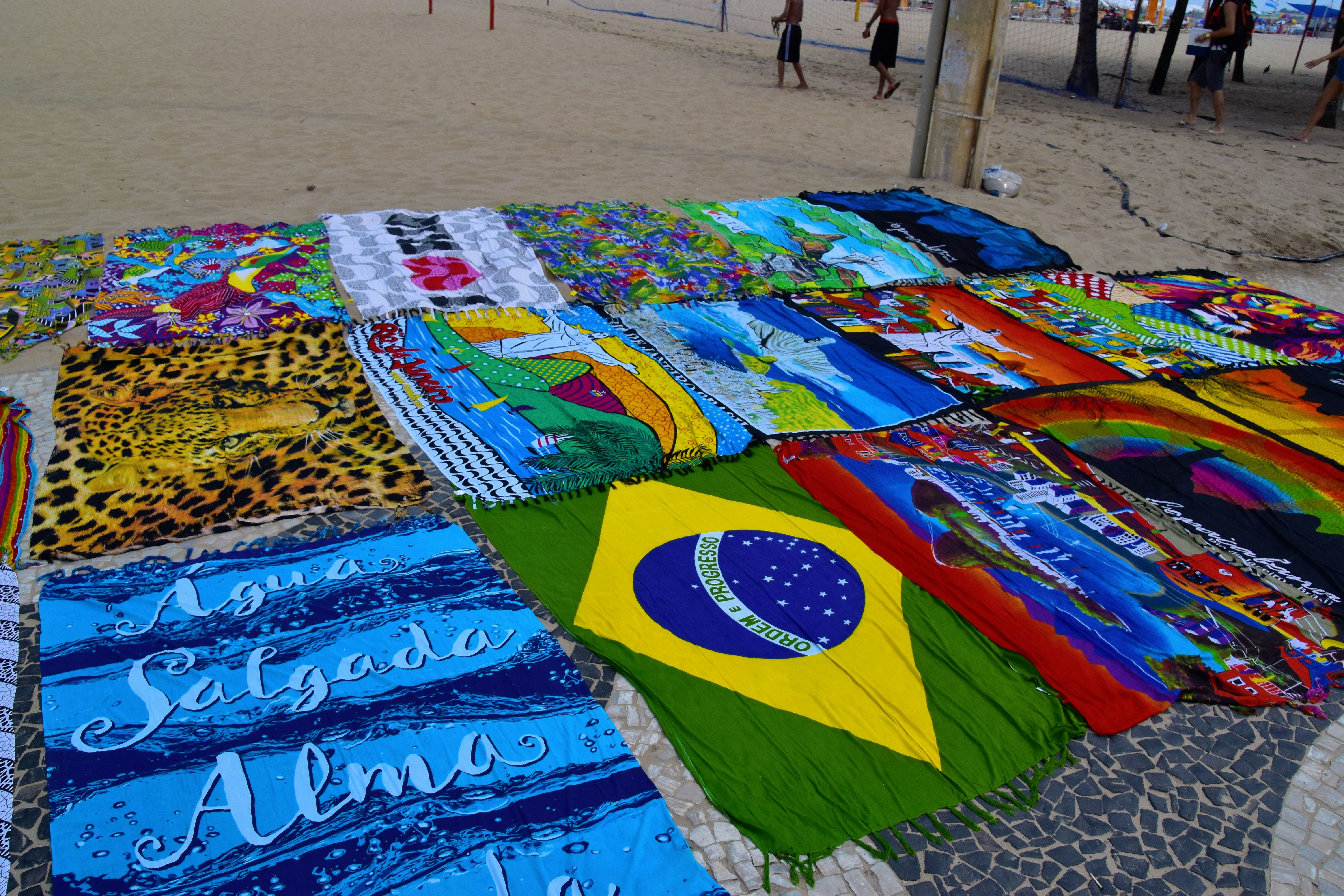 a group of colorful umbrellas on a beach
