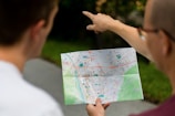 a person pointing at a map