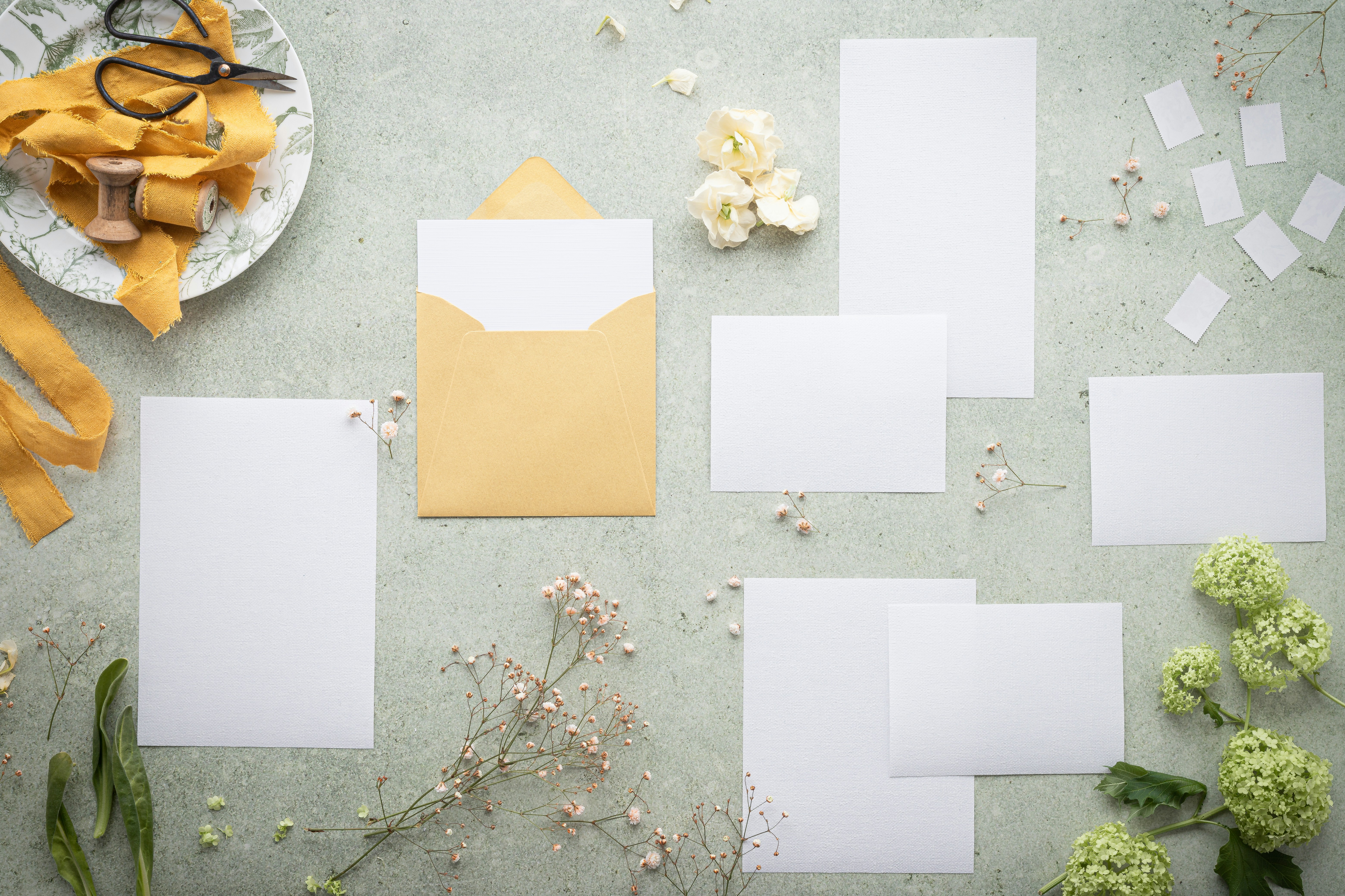 a group of white squares on a concrete surface