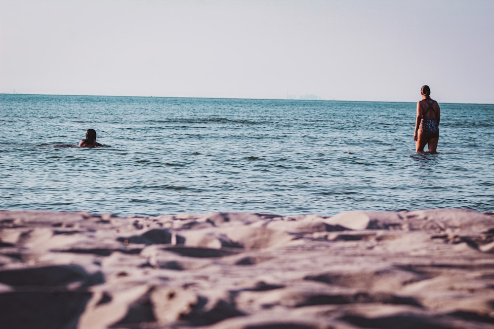 a couple of people in the water