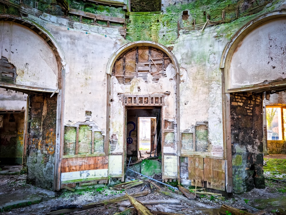 an old building with broken windows