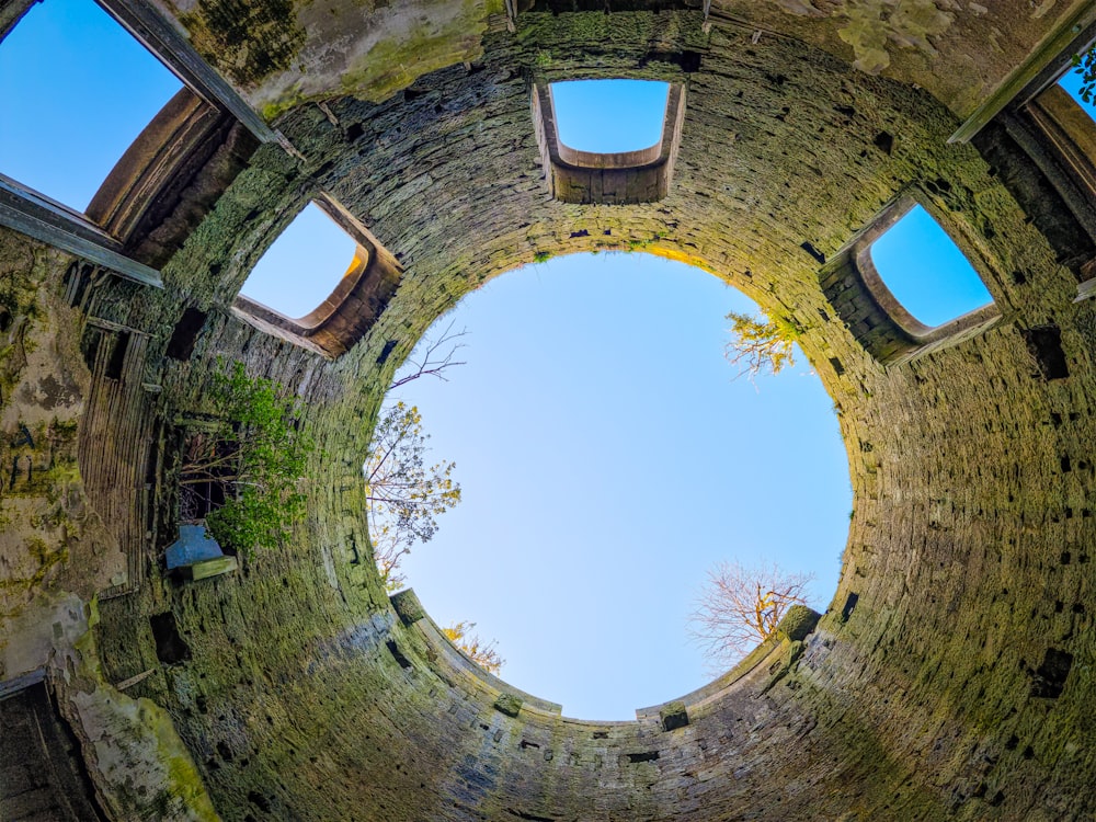 a stone archway with windows