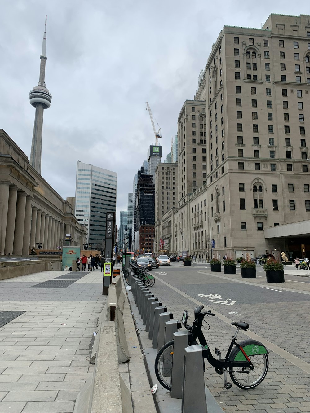 a city street with a tall tower