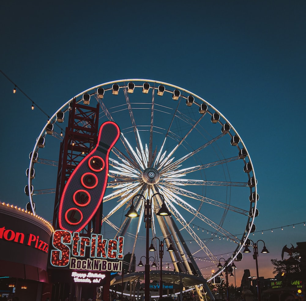 a ferris wheel at night