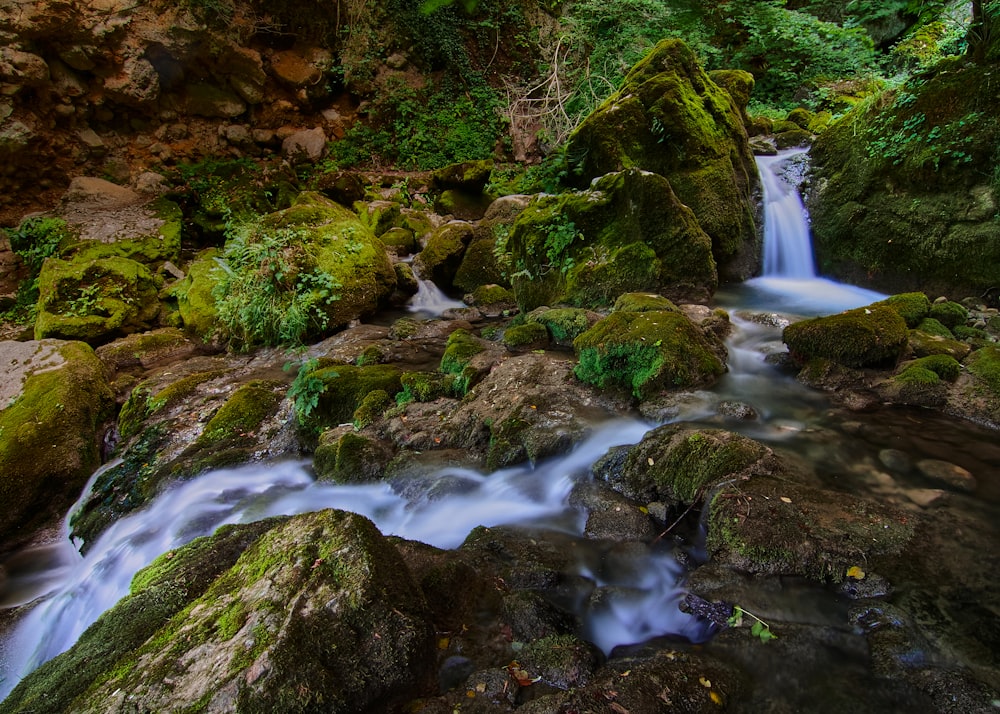 a small waterfall in a rocky area