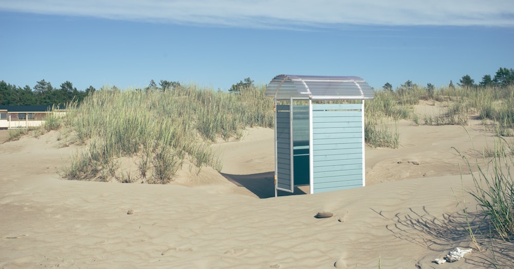 a small shack in the sand