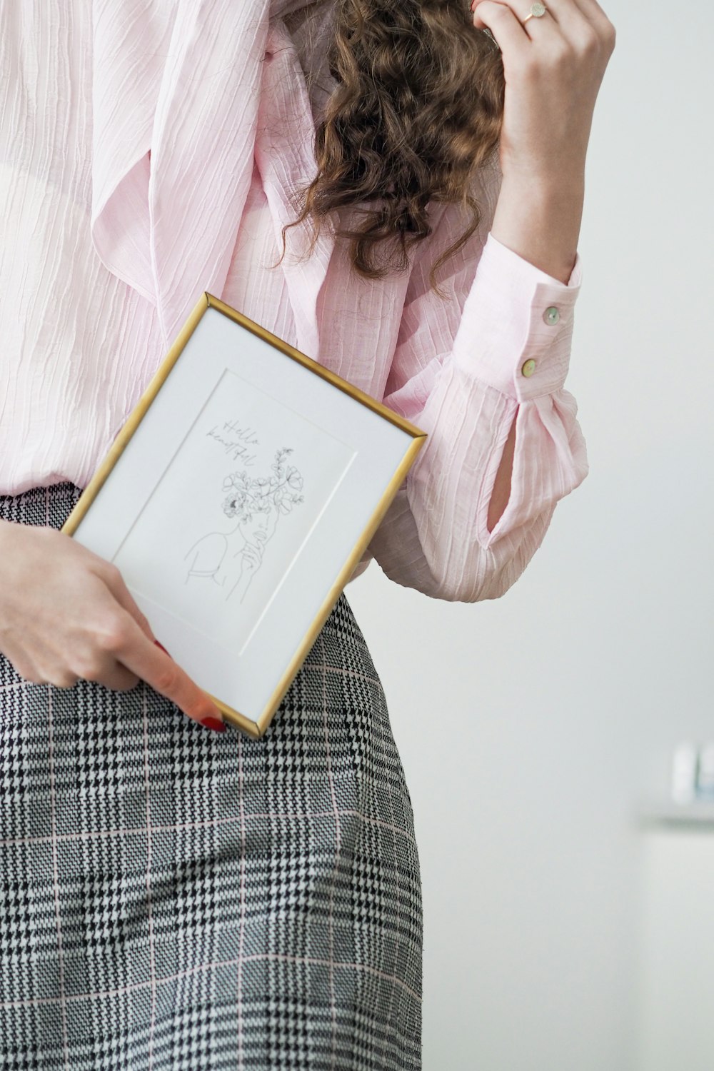 a person holding a drawing