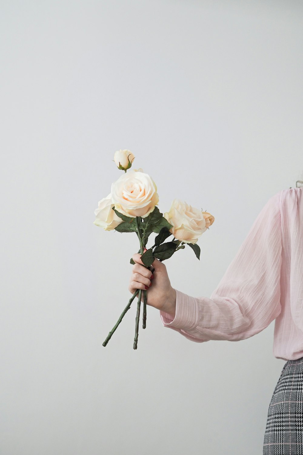 a person holding flowers