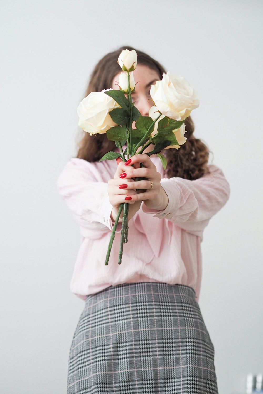 a person holding flowers