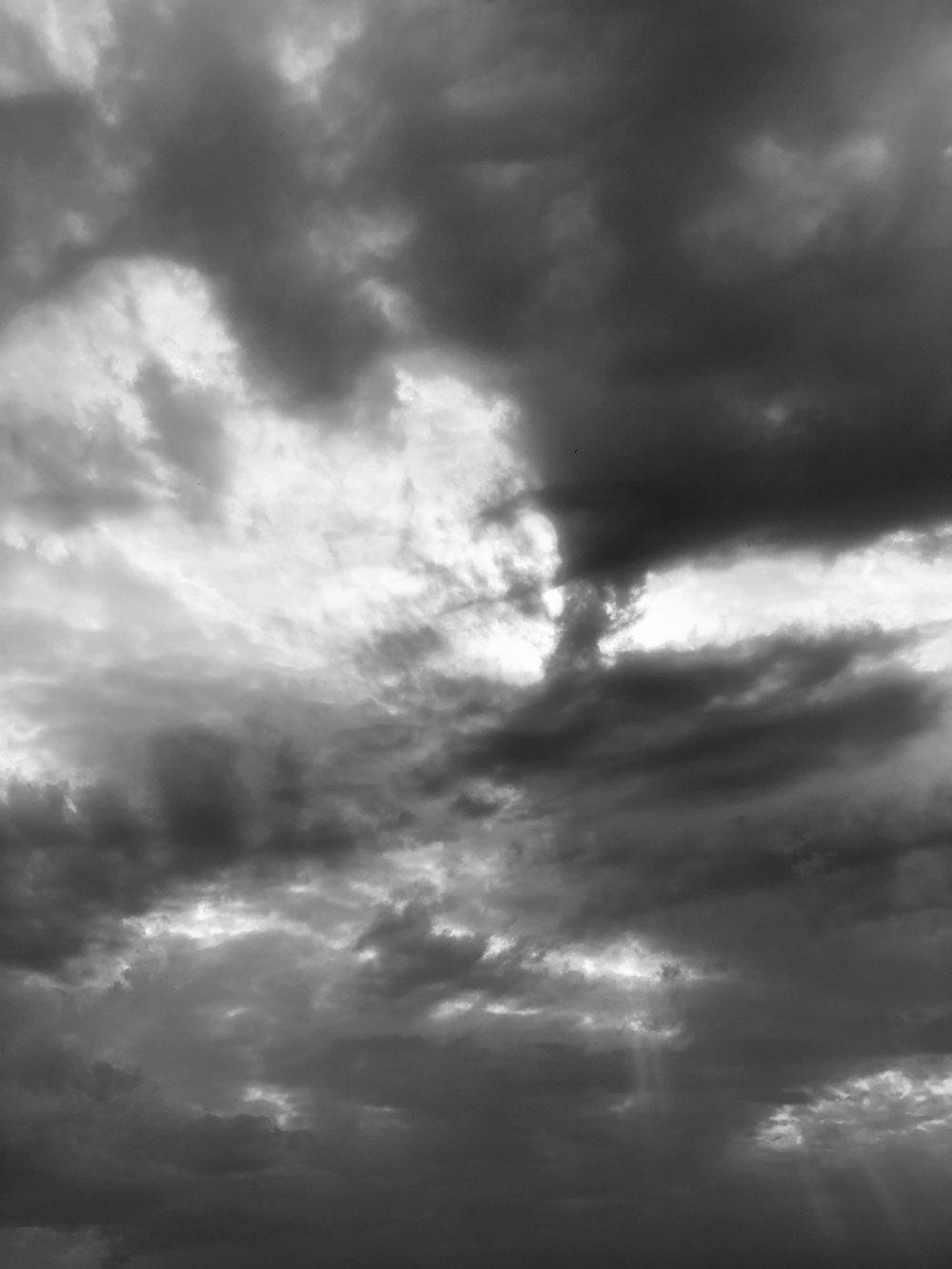a black and white photo of clouds