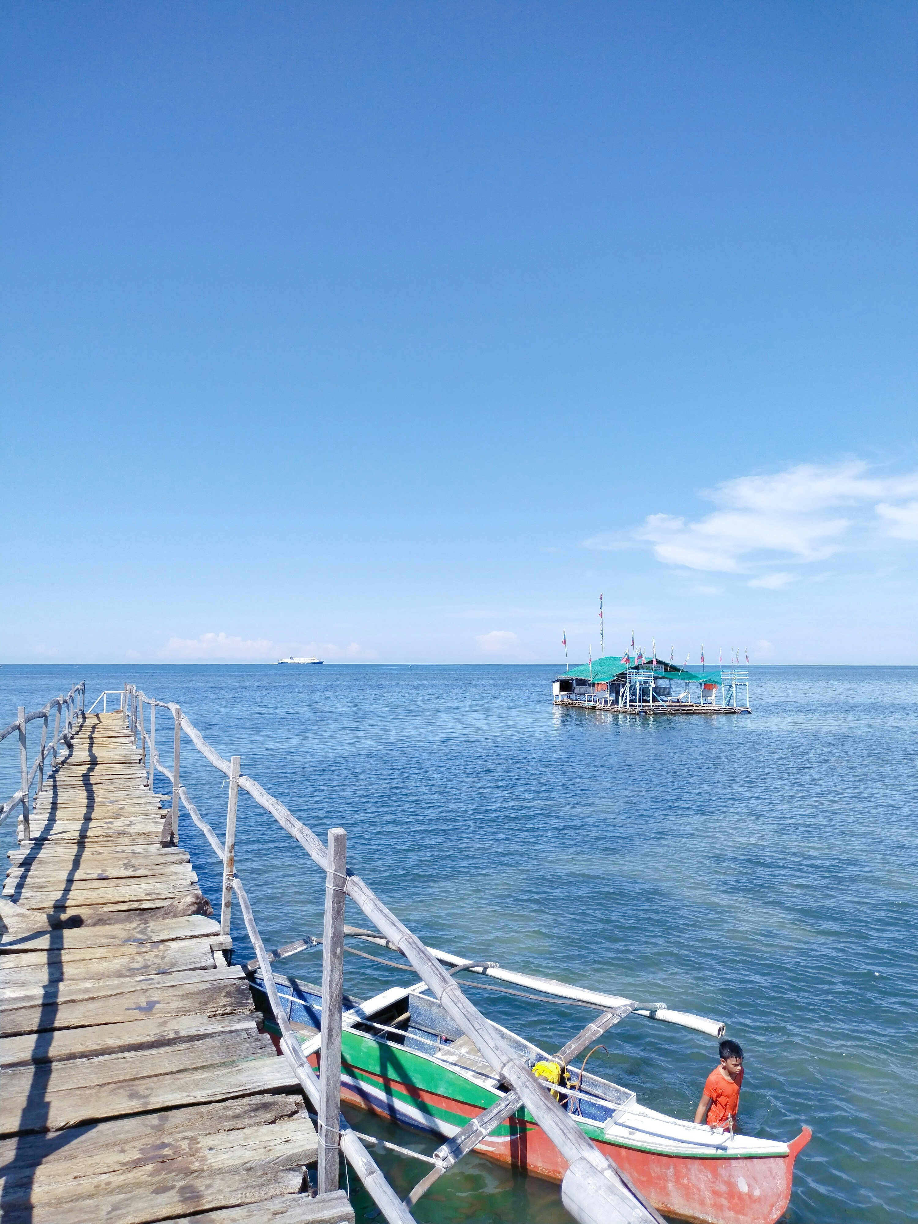 a boat is parked on the side of a dock