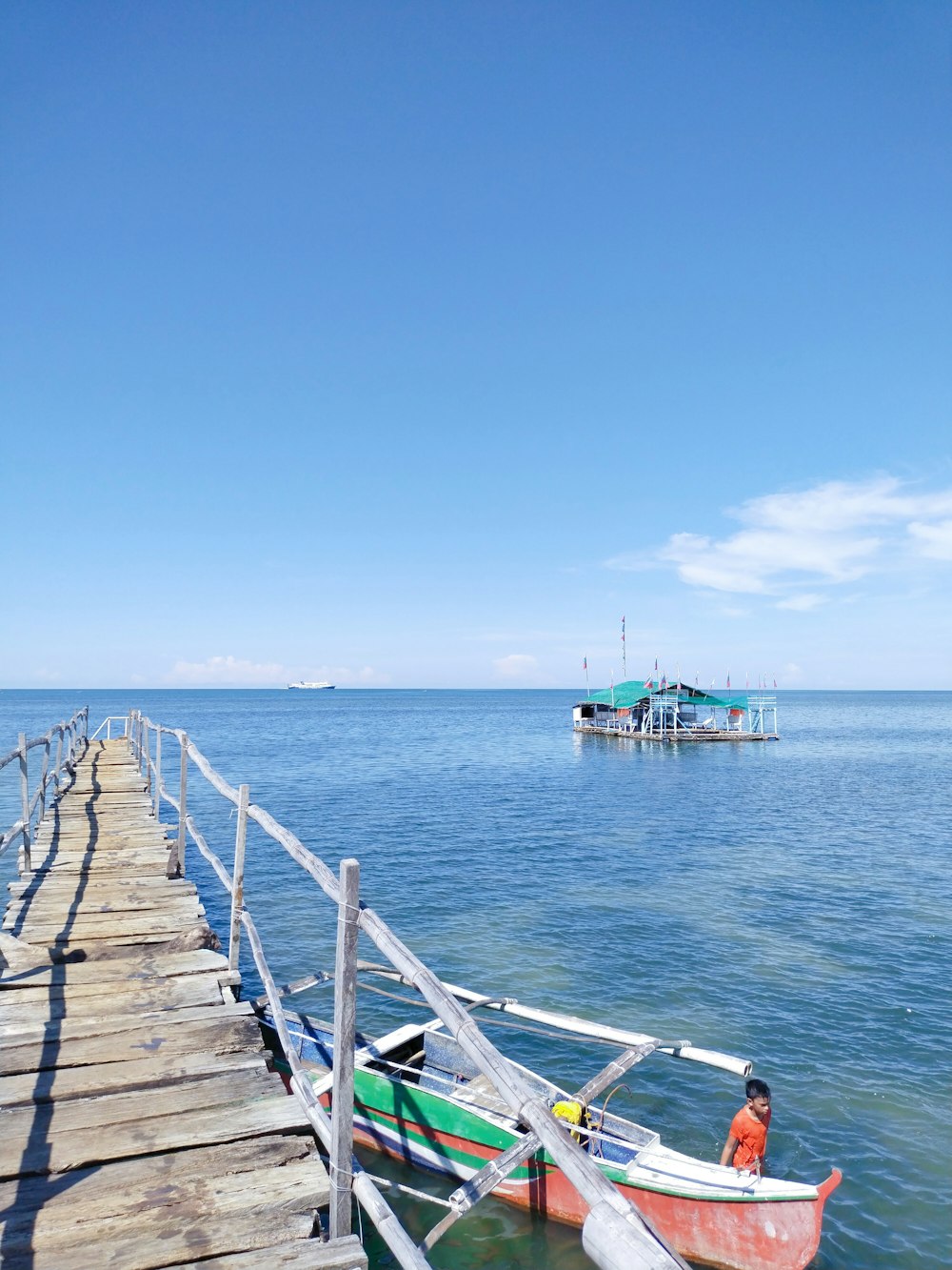 a boat is parked on the side of a dock