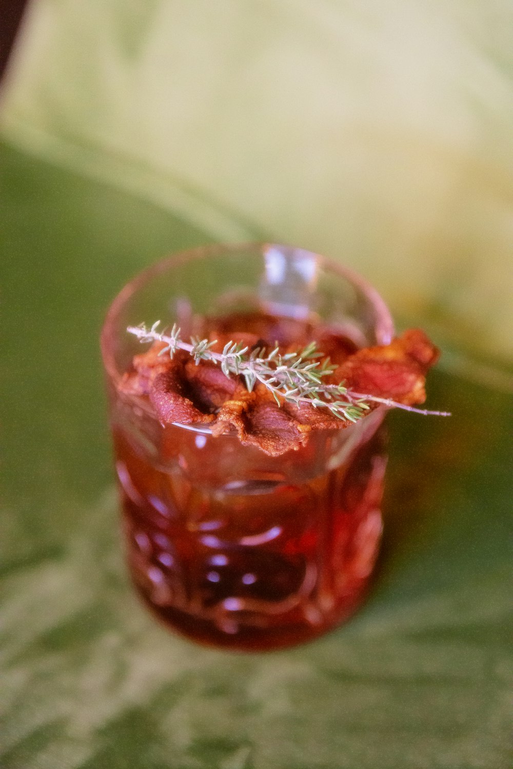 a glass of red liquid