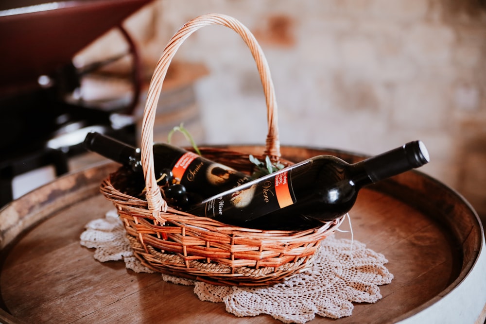 a bottle of wine in a basket