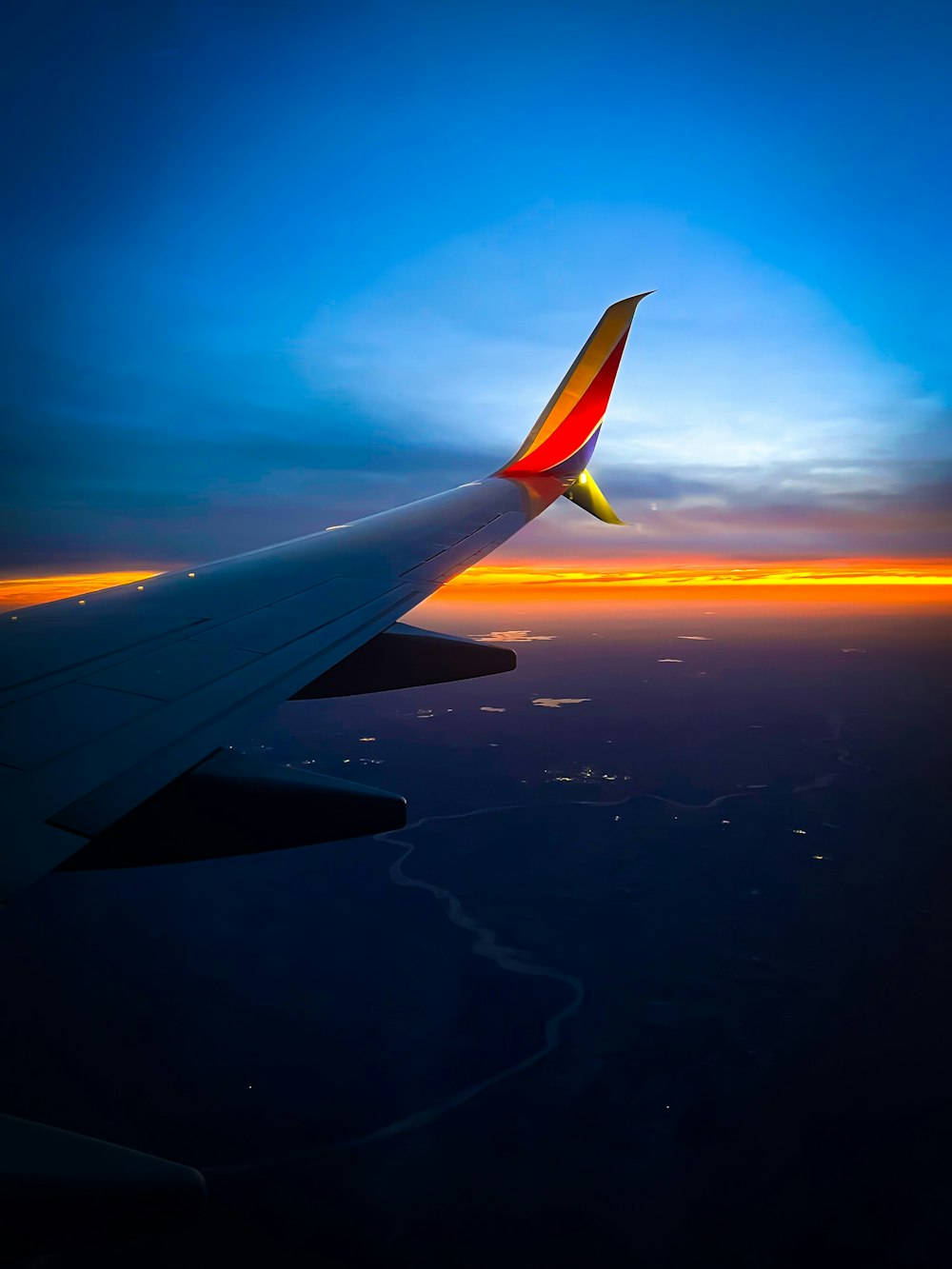 an airplane wing in the sky