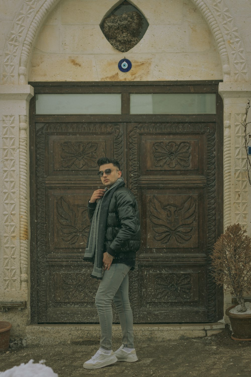 a man standing in front of a door