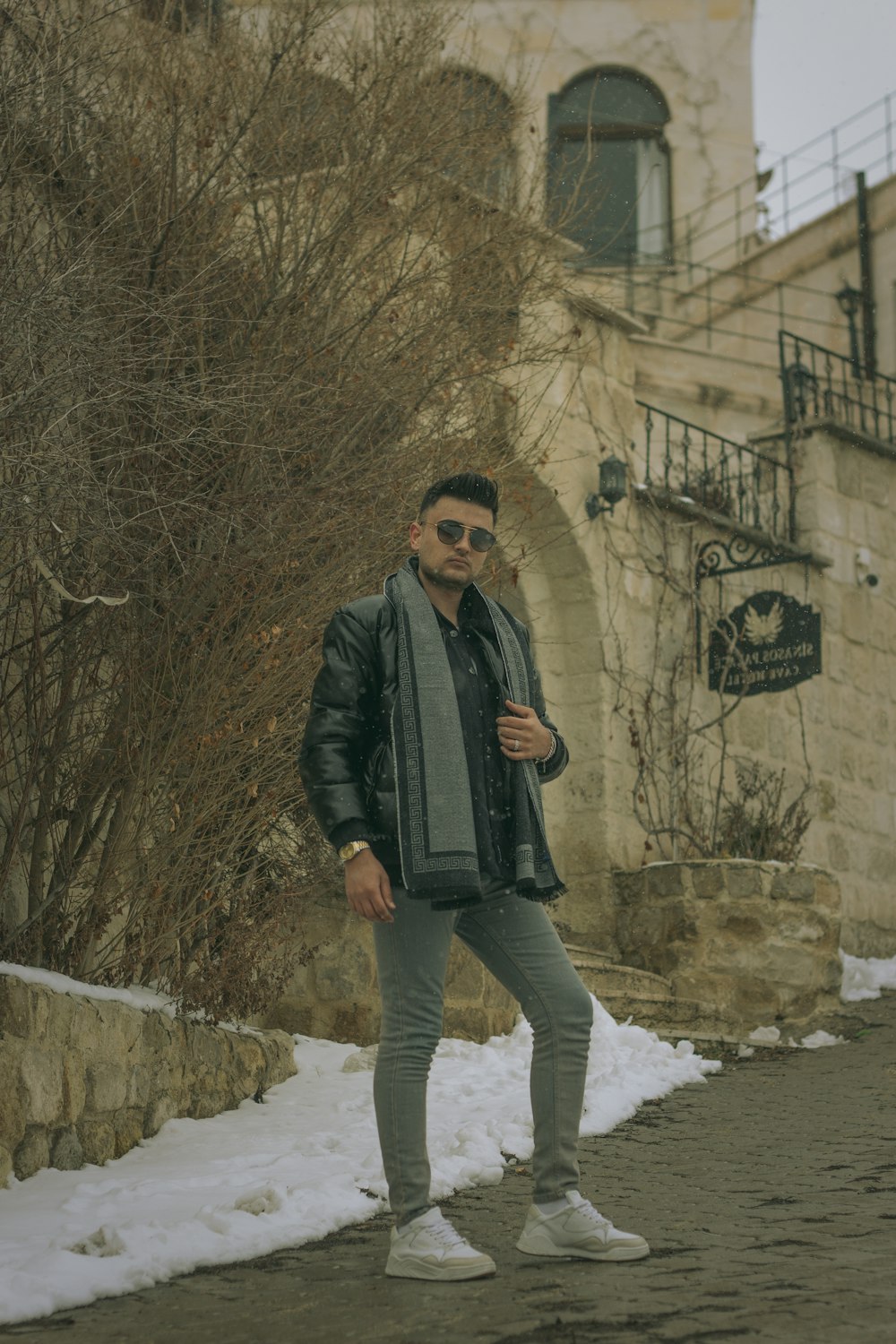 a man standing outside a building