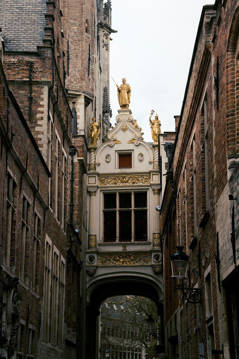 a building with a statue on top