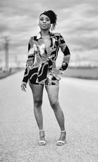 A confident woman walking home from the train station after a class, smiling and empowered.