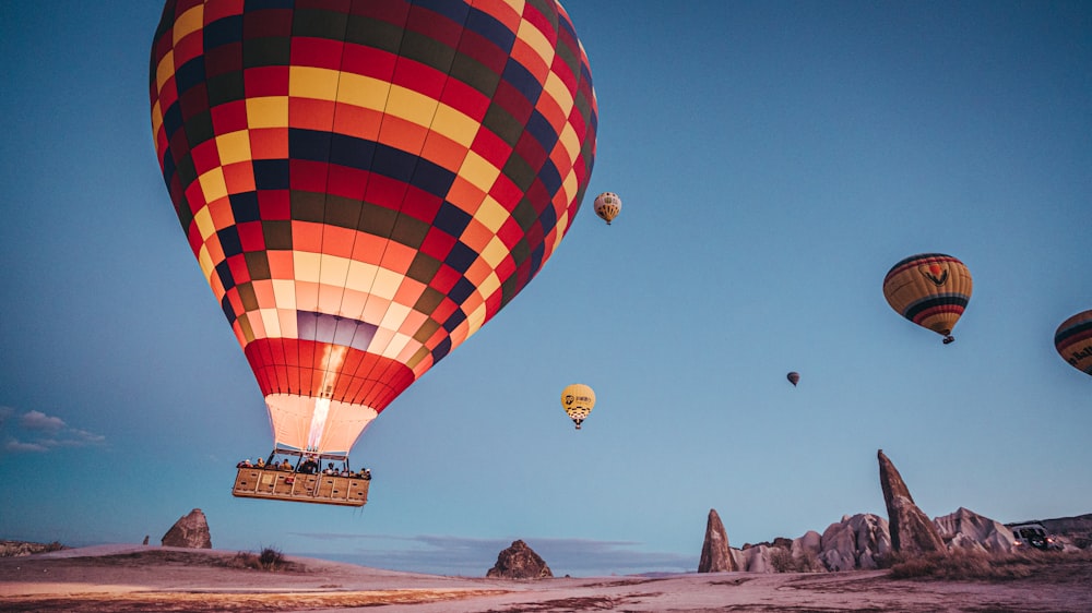 a group of hot air balloons in the sky