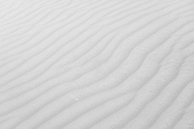 a close up of a snow covered field