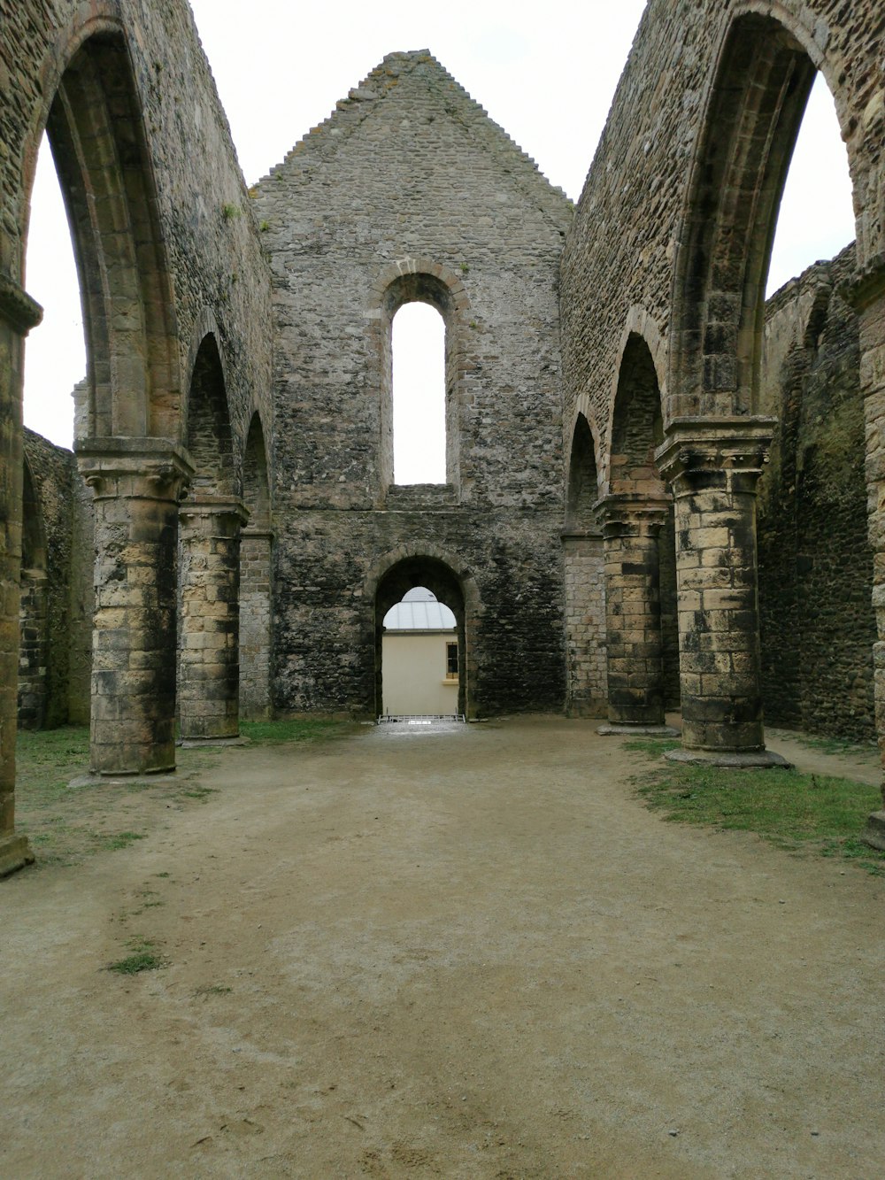 a stone building with arched windows