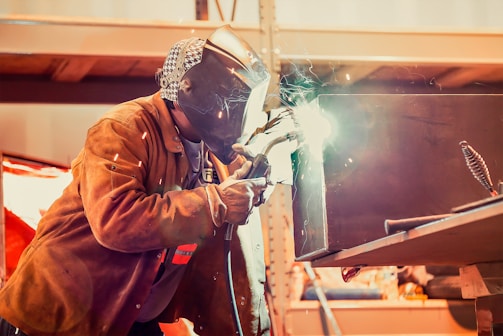 a couple of men wearing protective gear