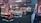 A vibrant arcade filled with various game machines, including pinball, claw machines, and video games. The lighting is bright with colorful neon signs and LED lights illuminating the area. Plush toys and other prizes are visible in some machines.