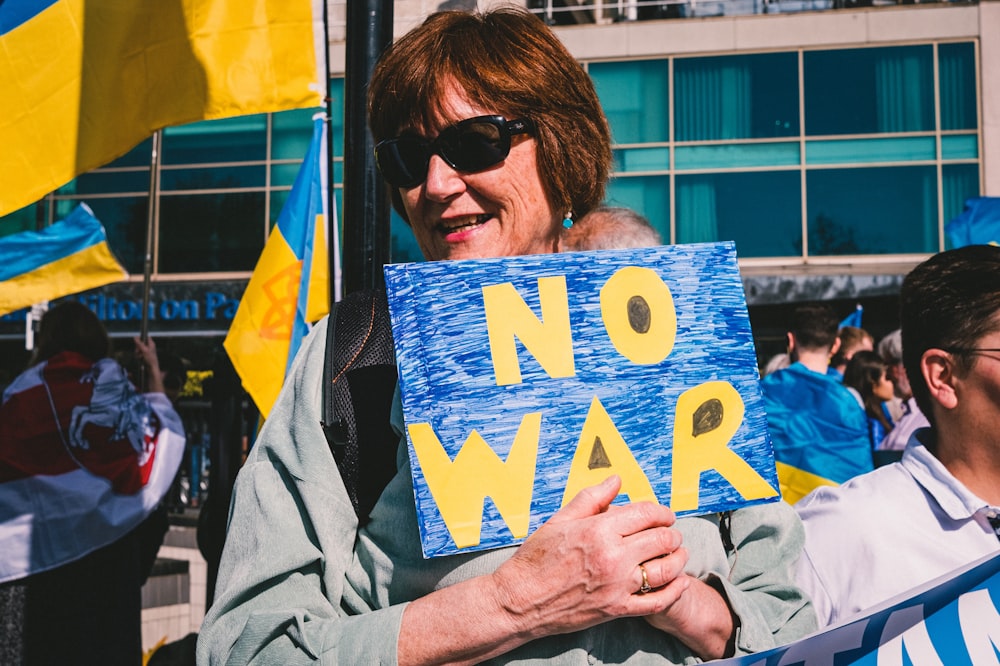 a man holding a sign