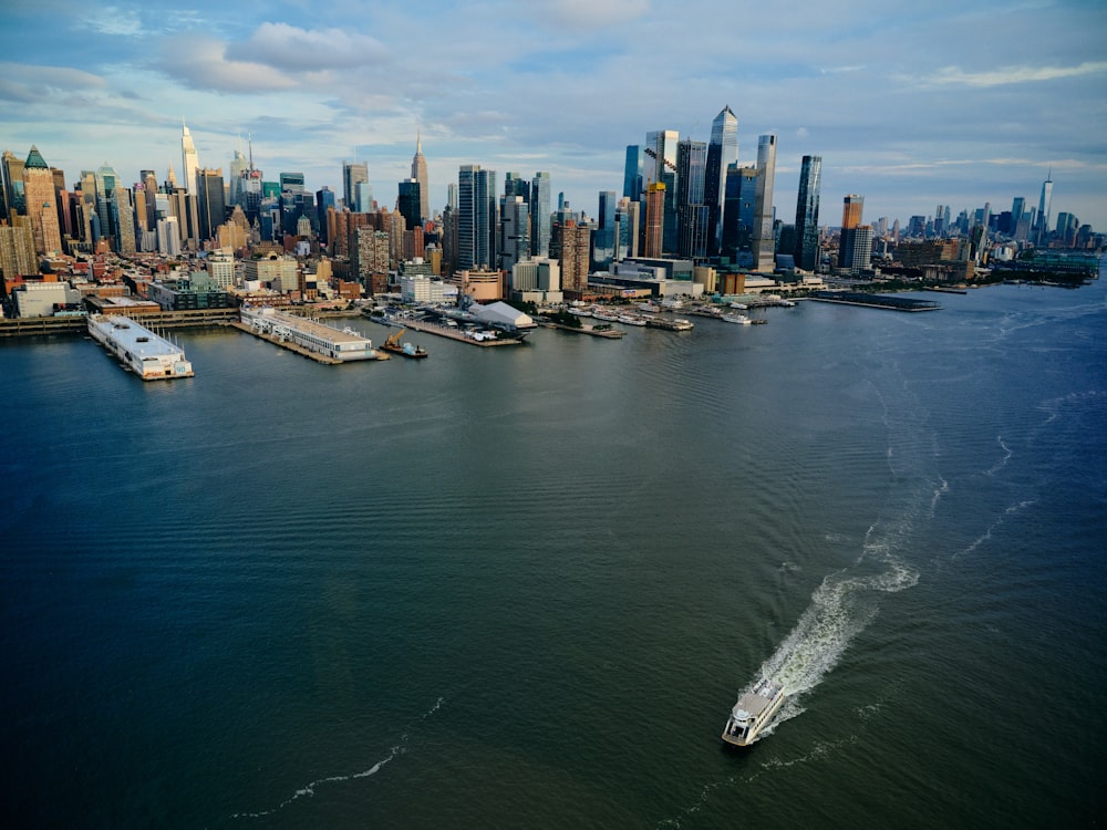 a city skyline with boats