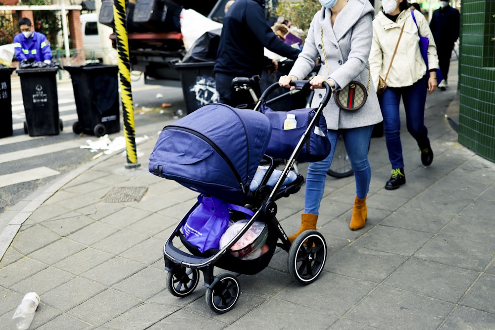 a person pushing a stroller