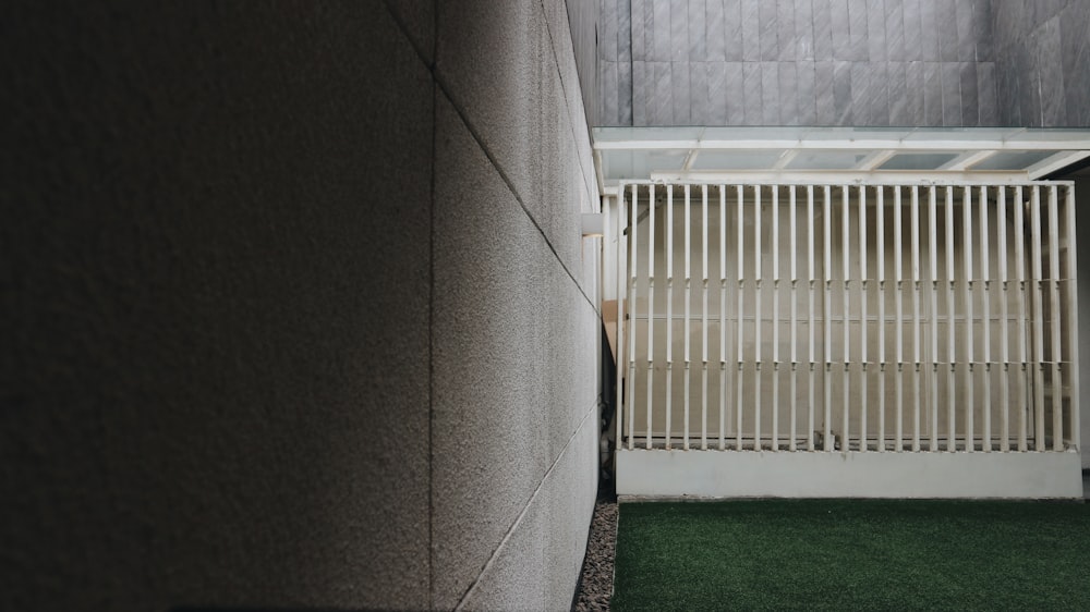 a white cage in a room