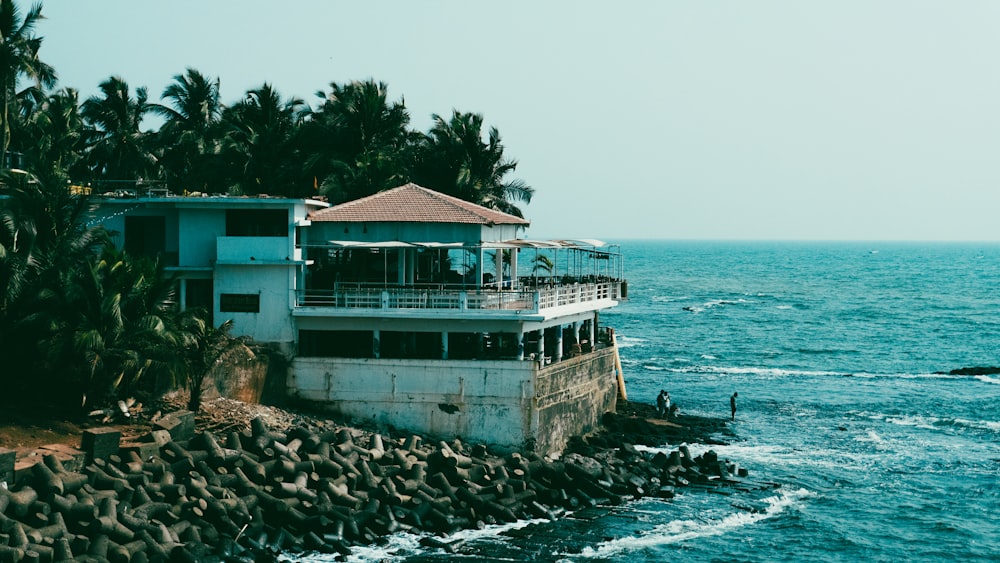 a house on a rocky shore