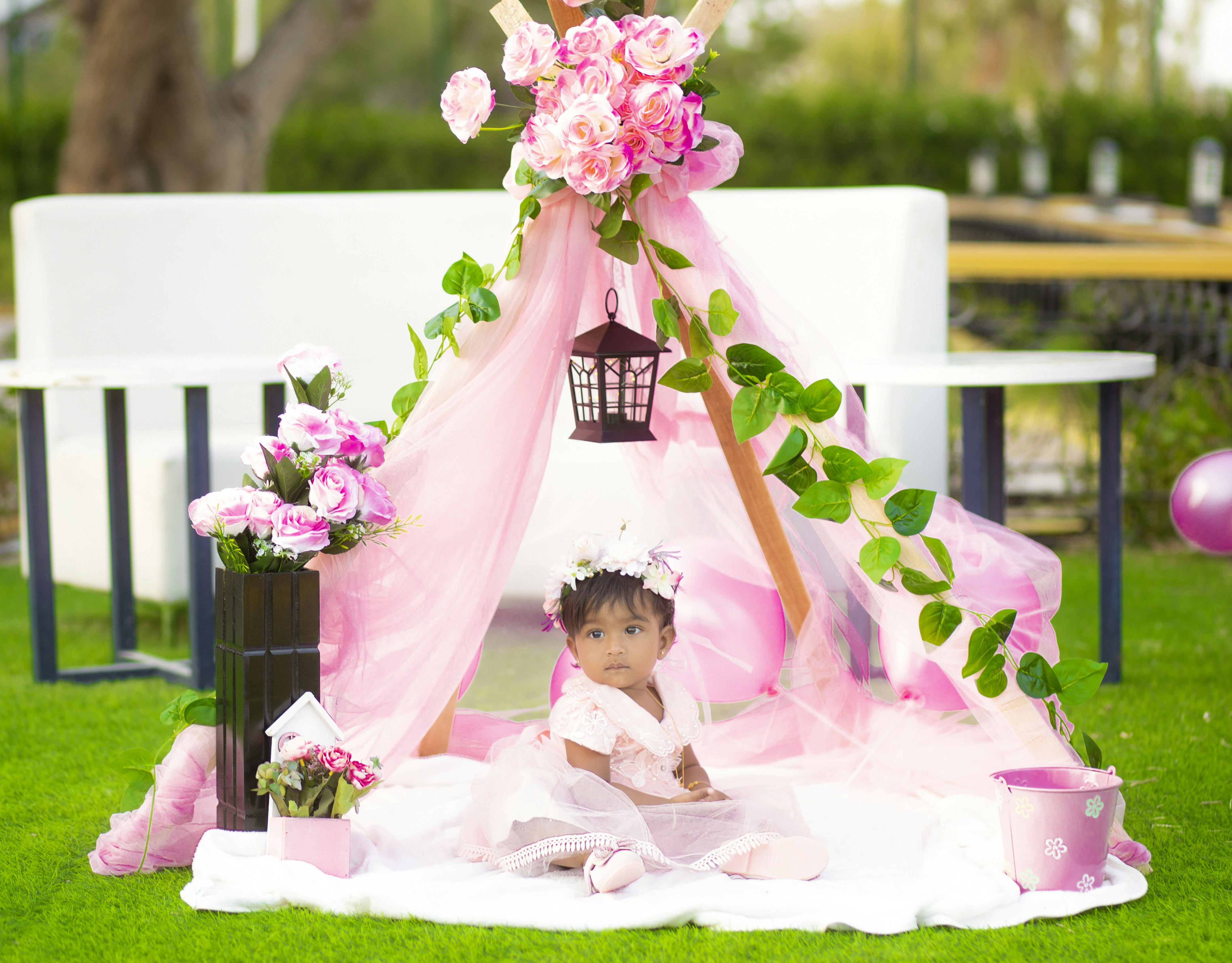 a doll sitting on a chair