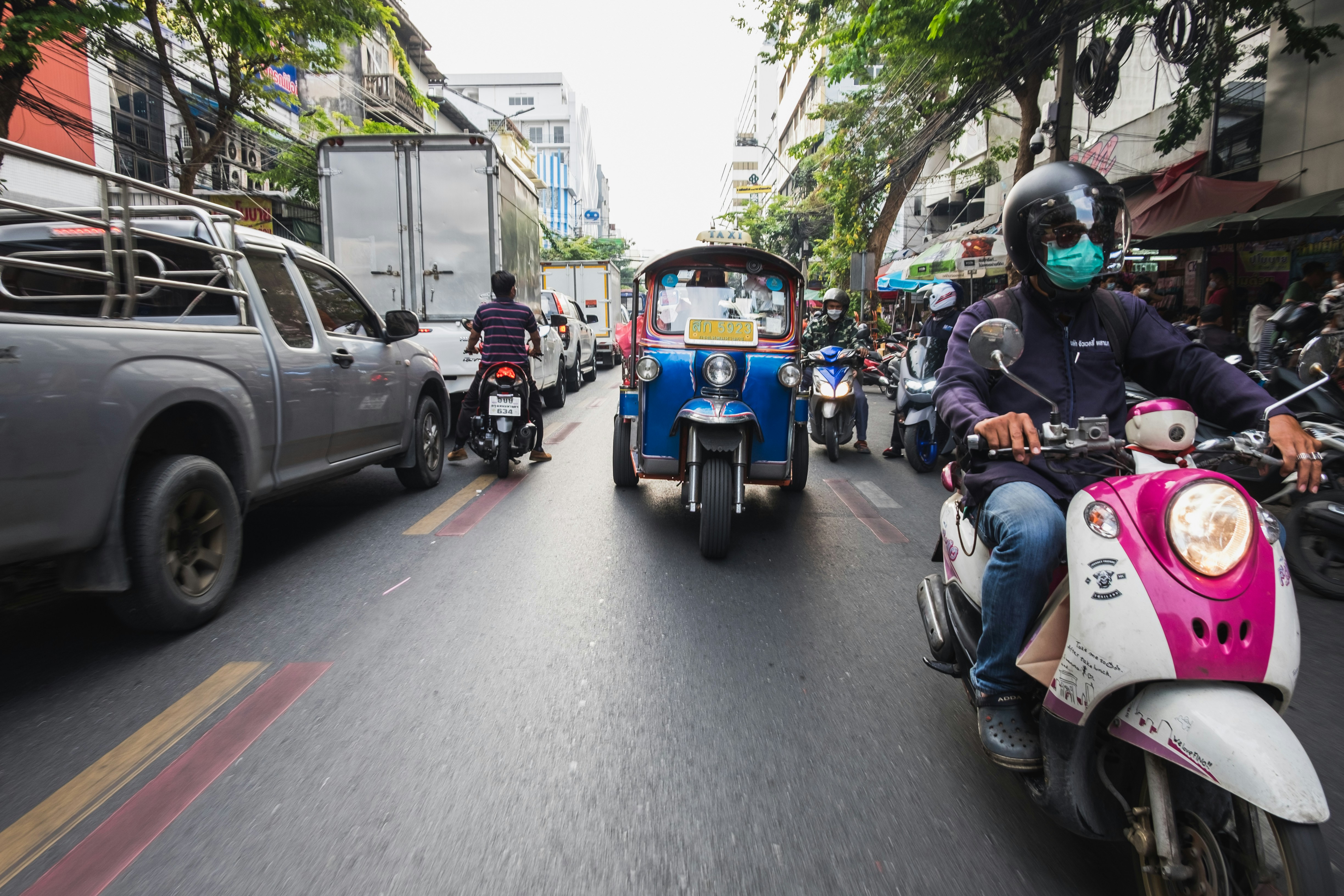 a group of police officers riding on the back of a motorcycle