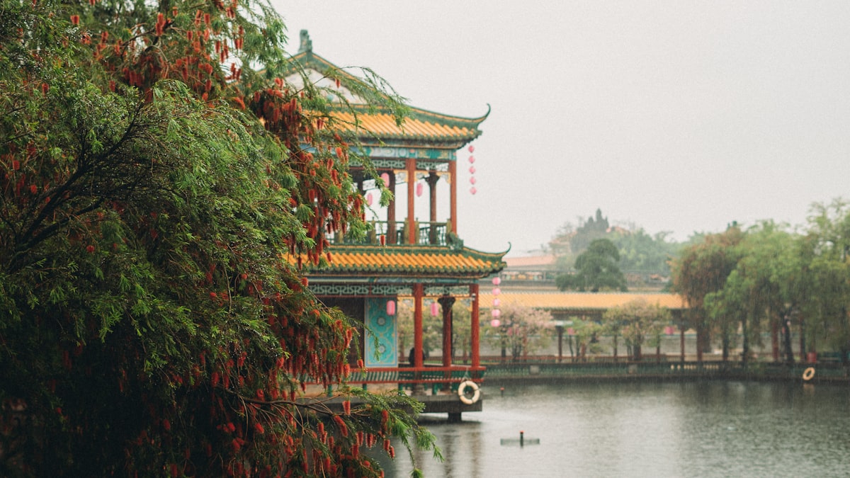 a pagoda building by a river