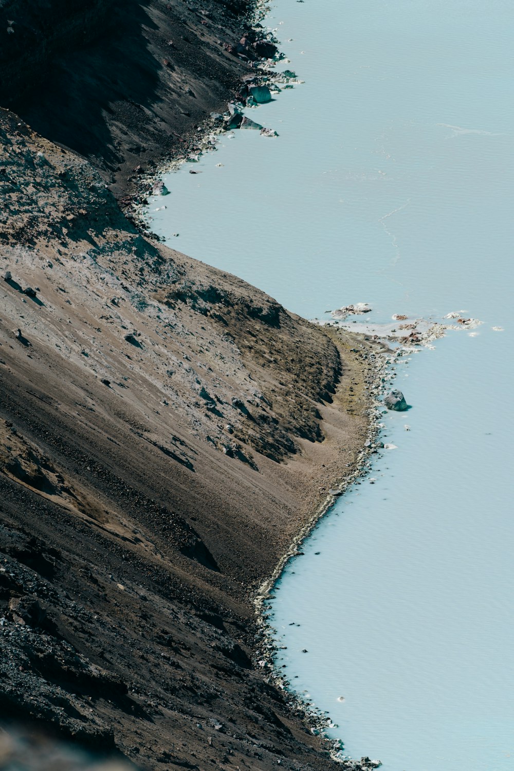 a beach with a body of water