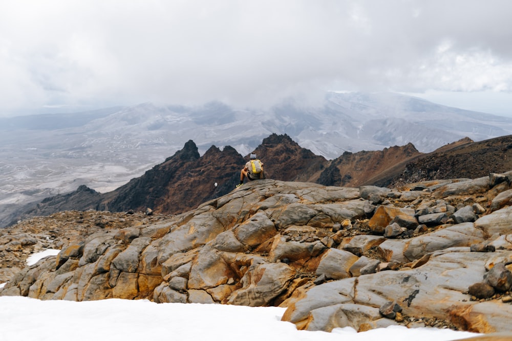 a person on a rocky mountain