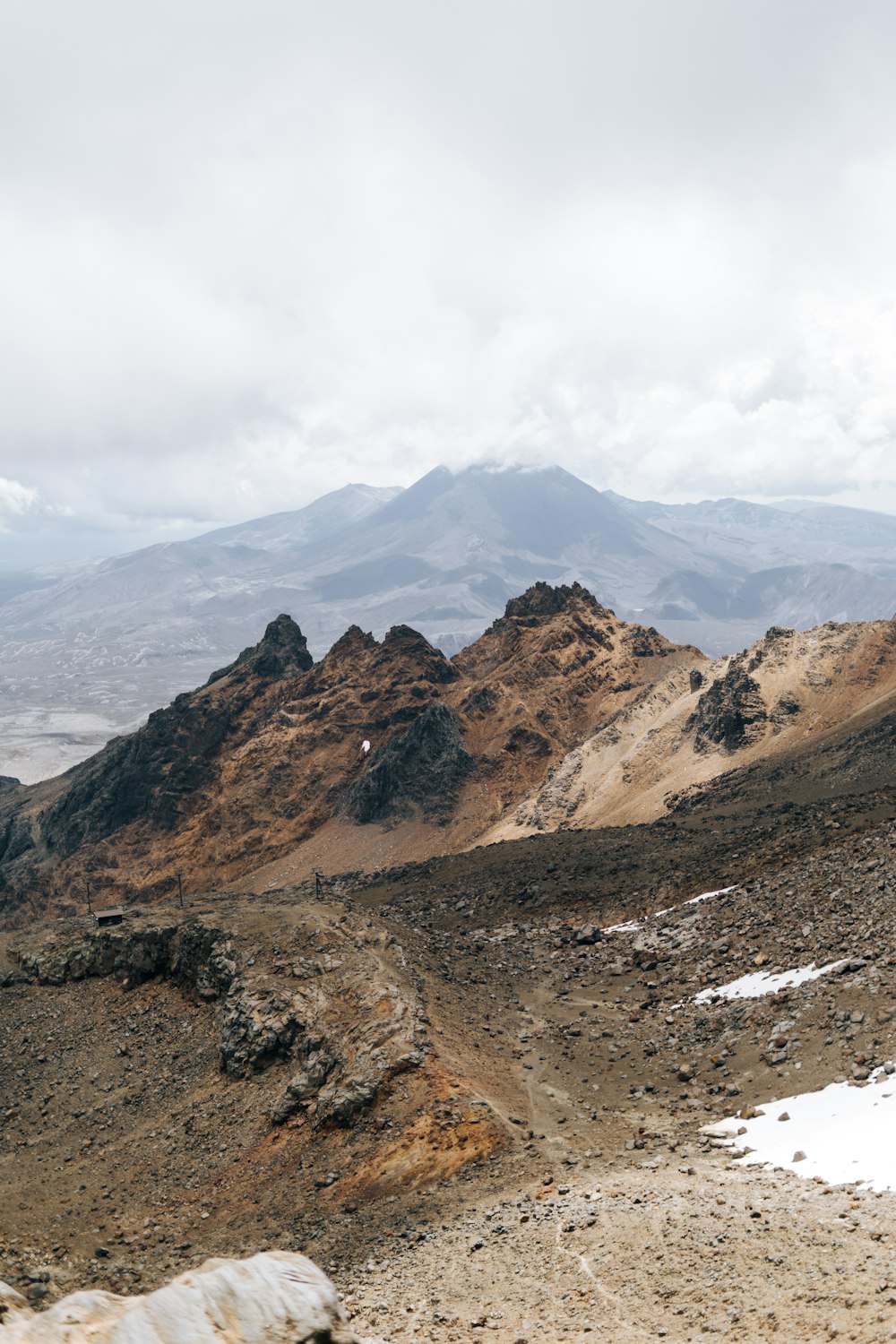 a rocky mountain with snow