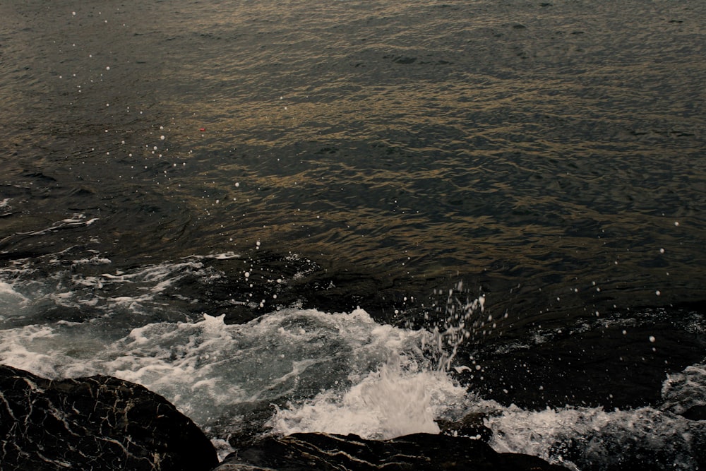 waves crashing on rocks