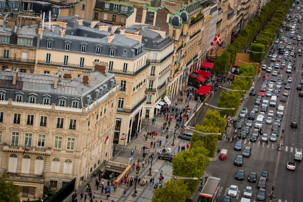 a busy street with cars and people