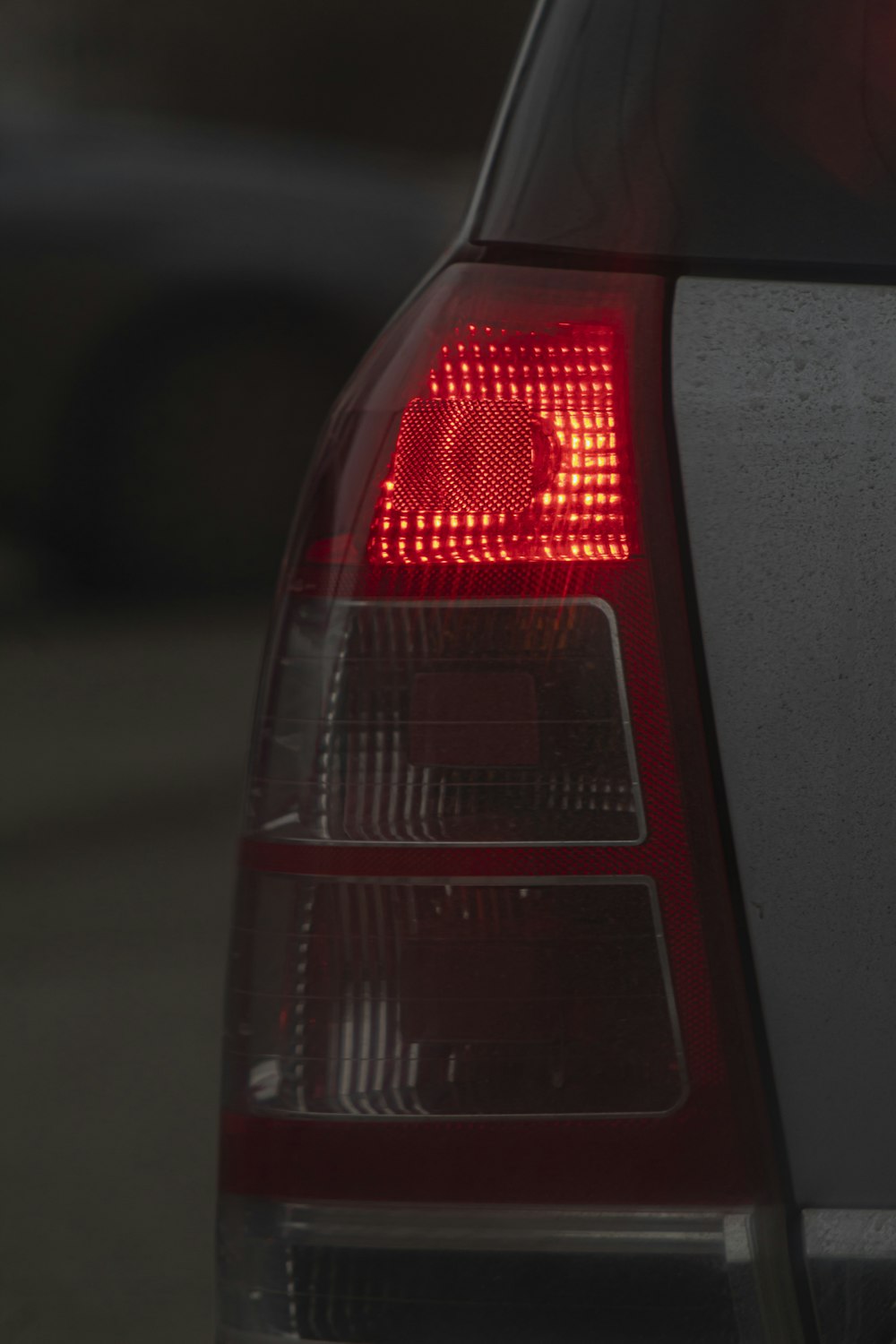 a red light on a black surface